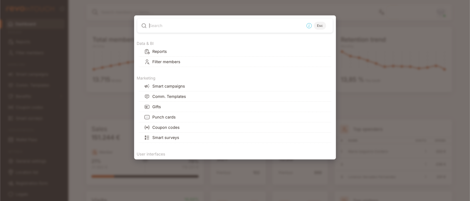 Das Overlay der Schnellnavigations-Palette. Die Kopfzeile zeigt "Search" mit einer Esc-Tastenkombination. Darunter: Bereich Data & BI (Reports, Filter members), Bereich Marketing (Smart campaigns, Comm. Templates, Gifts, Punch cards, Coupon codes, Smart surveys), Bereich User Interfaces (unter dem Fold abgeschnitten).