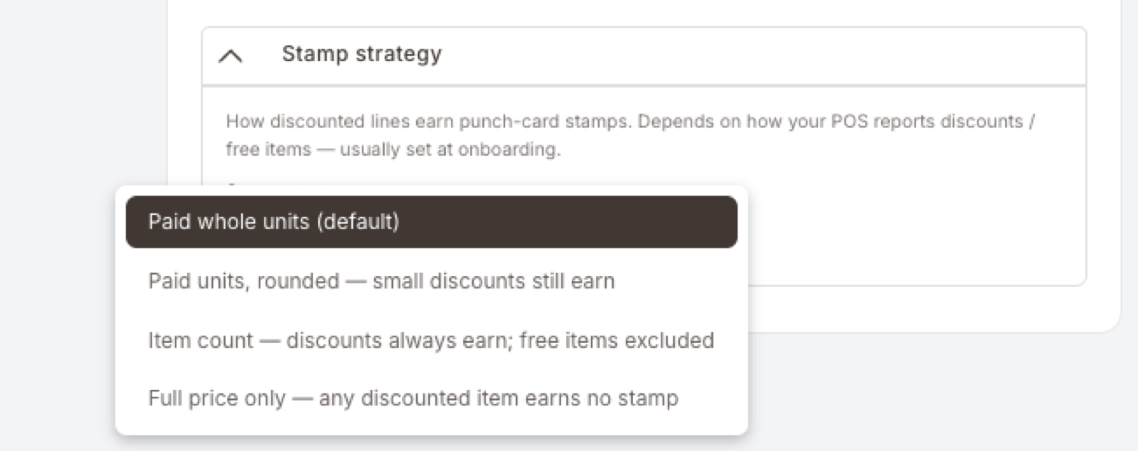 Das geöffnete Stamp-strategy-Dropdown mit den vier Optionen in dieser Reihenfolge: Paid whole units (default, hervorgehoben), Paid units rounded — small discounts still earn, Item count — discounts always earn; free items excluded, Full price only — any discounted item earns no stamp.